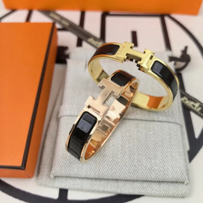 H - ARMBAND